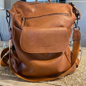 Soft leather like backpack/shoulder bag.